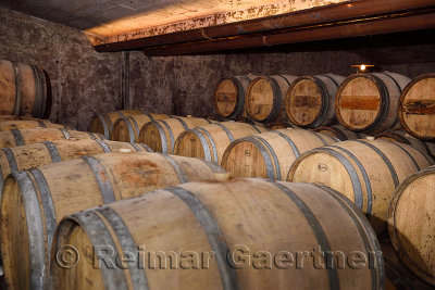 Constant temperature arched cellar with French barrique oak barrels to age wine at Kabaj Morel winery Slovrenc Dobrovo Brda Slov
