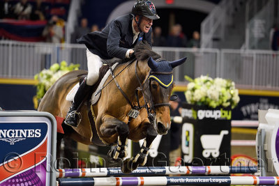 Ian Miller Captain Canada riding Dixson in the Longines FEI World Cup Show Jumping competition jump off at the Royal Horse Show 