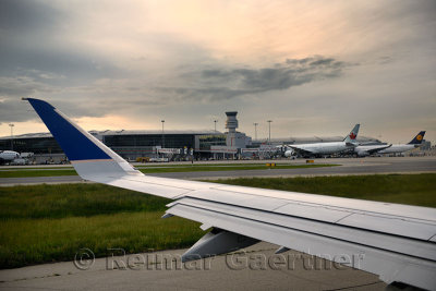 Jet airplane taking off on runway at Pearson International Airport at sundown Toronto Canada