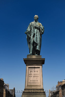 Bronze sculpture of William Pitt the Younger a British Prime Minister on George Street Edinburgh Scotland with blue sky