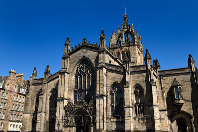 West facade of St Giles Cathedral with crown steeple in Parliament Square on the Royal Mile Edinburgh Scotland UK under blue sky
