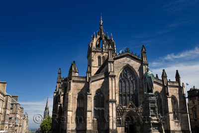 Statue of 5th Duke of Buccleuch and St Giles Cathedral with crown steeple in Parliament Square on the Royal Mile Edinburgh Scotl