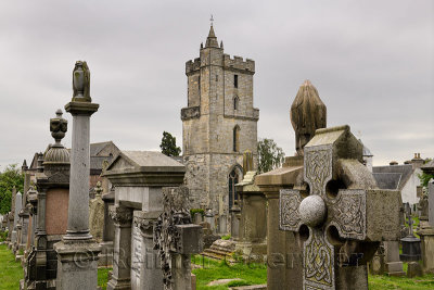 Church of the Holy Rude with Bell tower and Royal Cemetery with historic gravestones crosses and granite memorials on Castle Hil