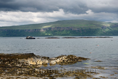 Fishnish net pen marine farm on the Sound of Mull from the Isle of Mull Scotland UK