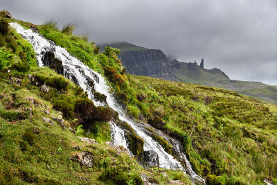 Brides Veil WaterFalls creek to Loch Leathan at The Storr with Old Man of Storr peak in clouds on Isle of Skye Inner Hebrides Sc