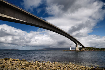 Skye Bridge to Isle of Skye over Kyle Akin Strait from Inner Sound to Loch Alsh and Eilean Ban Island with white Kyleakin lighth