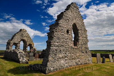 13th Century St Mary Chapel ruins of fieldstone with cemetery gravestones at Old Rattray Aberdeenshire Scotland UK
