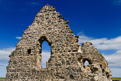 13th Century St Mary Chapel ruins of fieldstone at Old Rattray Aberdeenshire Scotland UK with blue sky