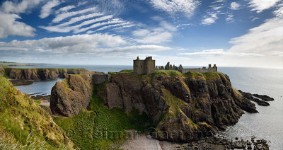 Panorama of Dunnottar Castle Medieval clifftop ruins from cliff at Old Hall Bay North Sea near Stonehaven Scotland UK