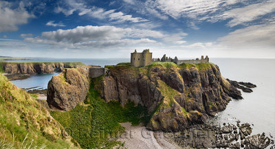 Panorama of Dunnottar Castle Medieval clifftop ruins from cliff above rocks of Old Hall Bay North Sea near Stonehaven Scotland U