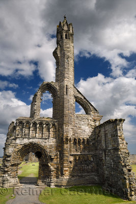 Sun on stone ruins of the 14th Century West Entrance and tower of St Andrews Cathedral with clouds St Andrews Fife Scotland UK