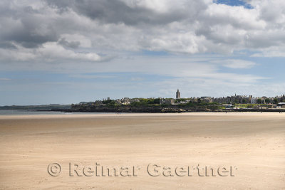 View of St Andrews city skyline from wide West Sands beach used in movie Chariots of Fire on the North Sea Fife Scotland UK
