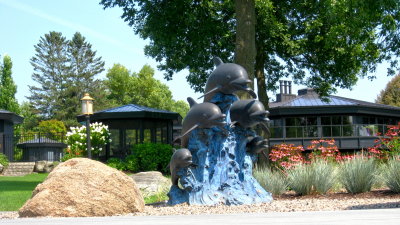 Very cool sculpture in front of a home