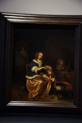 Interior with a Mother Combing her Childs Hair, Known as Maternal Care (1669) - Caspar Netscher - 4800