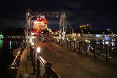 Disney Springs bridge and Rainforest Cafe, night