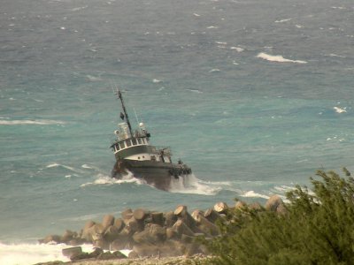 Tugboat struggles with wind and waves, Nassau