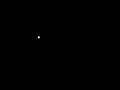 Jupiter and 4 of its moons