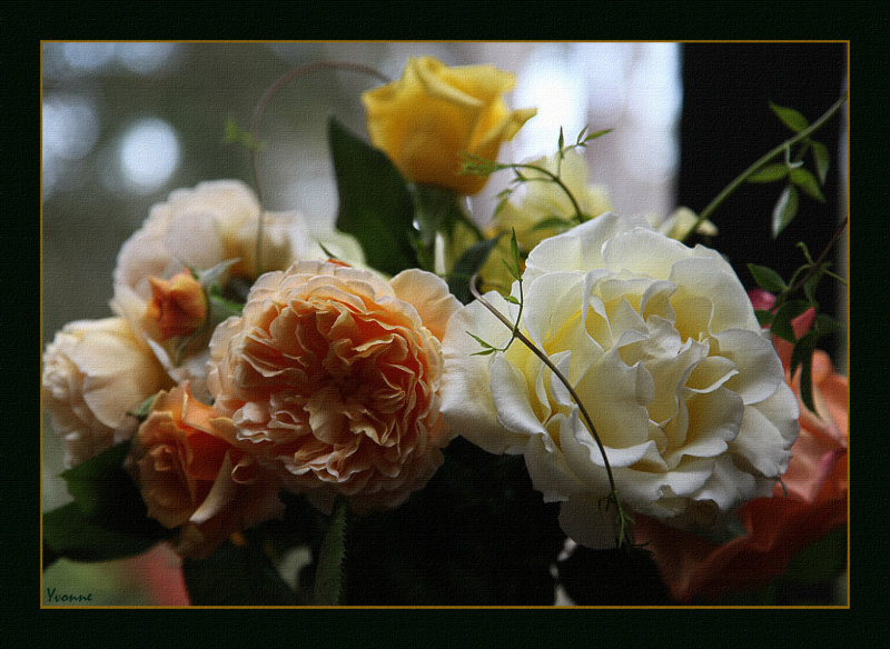 A bouquet of lemon & apricot toned roses