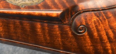Cheek piece carving