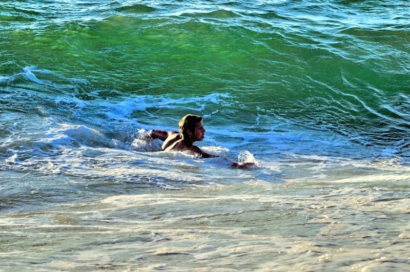 Swimming In The Cold Waters Near Sunset