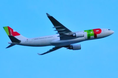 TAP-Portugal A330-200, CS-TOO, Climbing at Dusk