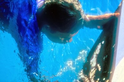 Cleaning The Boat Underwater