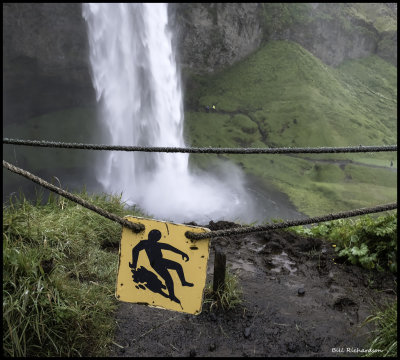 Seljalandsfoss waterfall danger sign.jpg
