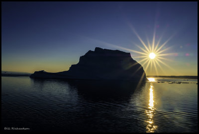 entering pack ice iceberg sunset.jpg