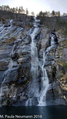 Waterfall seen on fjord cruise