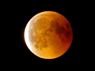 The east side of the moon leaves the earth's shadow