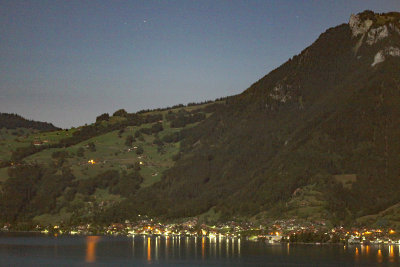 Looking across the lake in the night with moonlight at 3 a.m.
