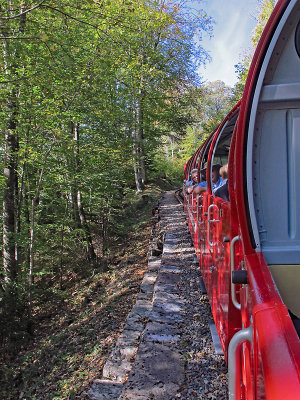 The train moves with a speed of between 6.8 km/h to 7.6 km/h while climbing