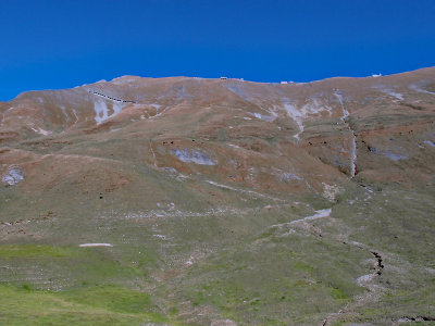 Climbing further - the last part of the track with the slow-moving steam-train