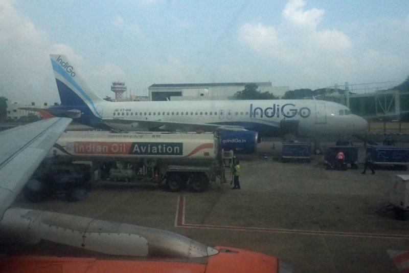 Out of the dirty window of an Air India A30 at MAA