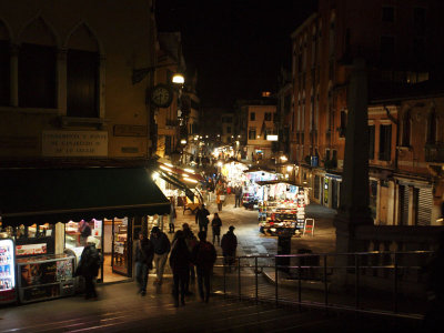 View from a bridge of a street in Venice in the evening