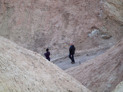 Hikers down in the canyon in the Badlands, Death Valley