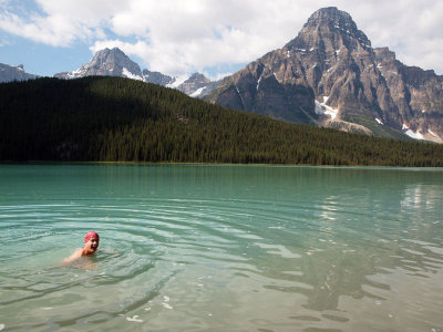 Swimming in Waterfowl lake in the shadow on Mt. Chephren