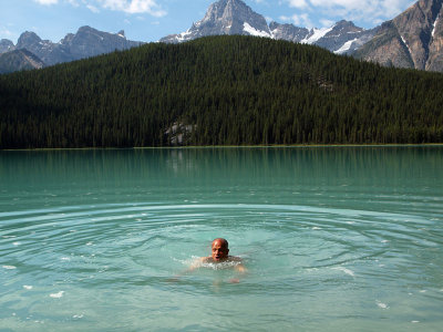 The first to go into the glacial waters of Waterfowl Lake