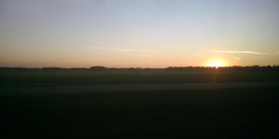 On the bus from Calgary to Edmonton as the sun sets