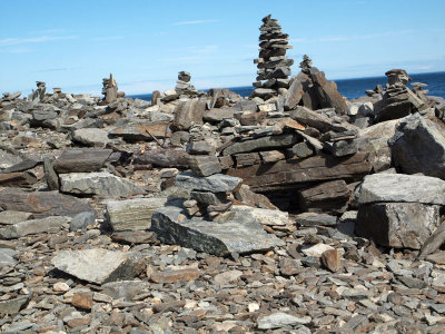 Cairn-like structures created by tourists on Peaks Island