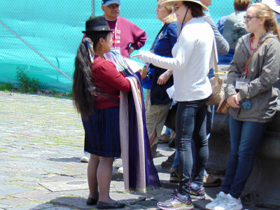 Selling her goods near the church of St. Francis, Quito