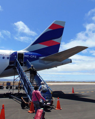 Boarding our aircraft at Baltra airport - LATAM Ecuador Airbus A319-132 