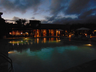 Across the pool at the Finch Bay Hotel after sunset