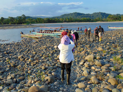 Returning to our boats after visit of village of indegenous people, Equatorial Ecuador