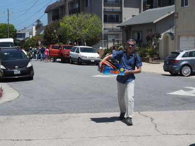 Carrying games to the Seabright beach, the day before the wedding