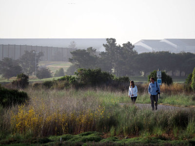 Morning walkers in the park in South San Francisco bay