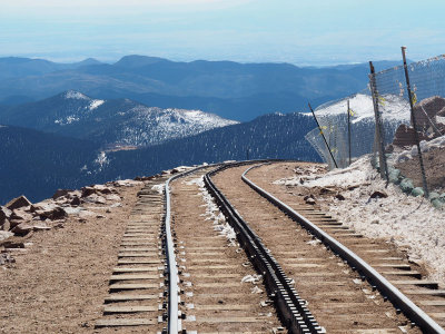 Cog railroad tracks heading downhill from Pikes Peak