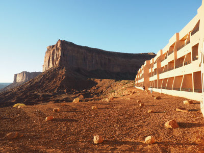 Rising sun lights up Mitchell Mesa and our hotel, Monument Valley