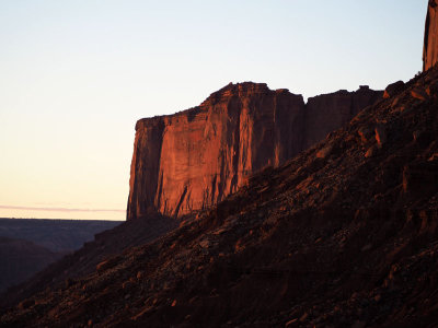 Ths early light hits a section of Mitchell Mesa at Monument Valley