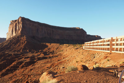 Rising sun lights up Mitchell Mesa and our hotel, Monument Valley